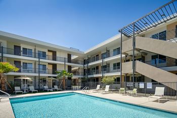 Swimming pool with built-in bench seating